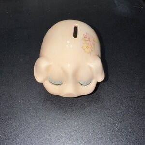 Vintage piggy bank hand painted with bottom stopper‎